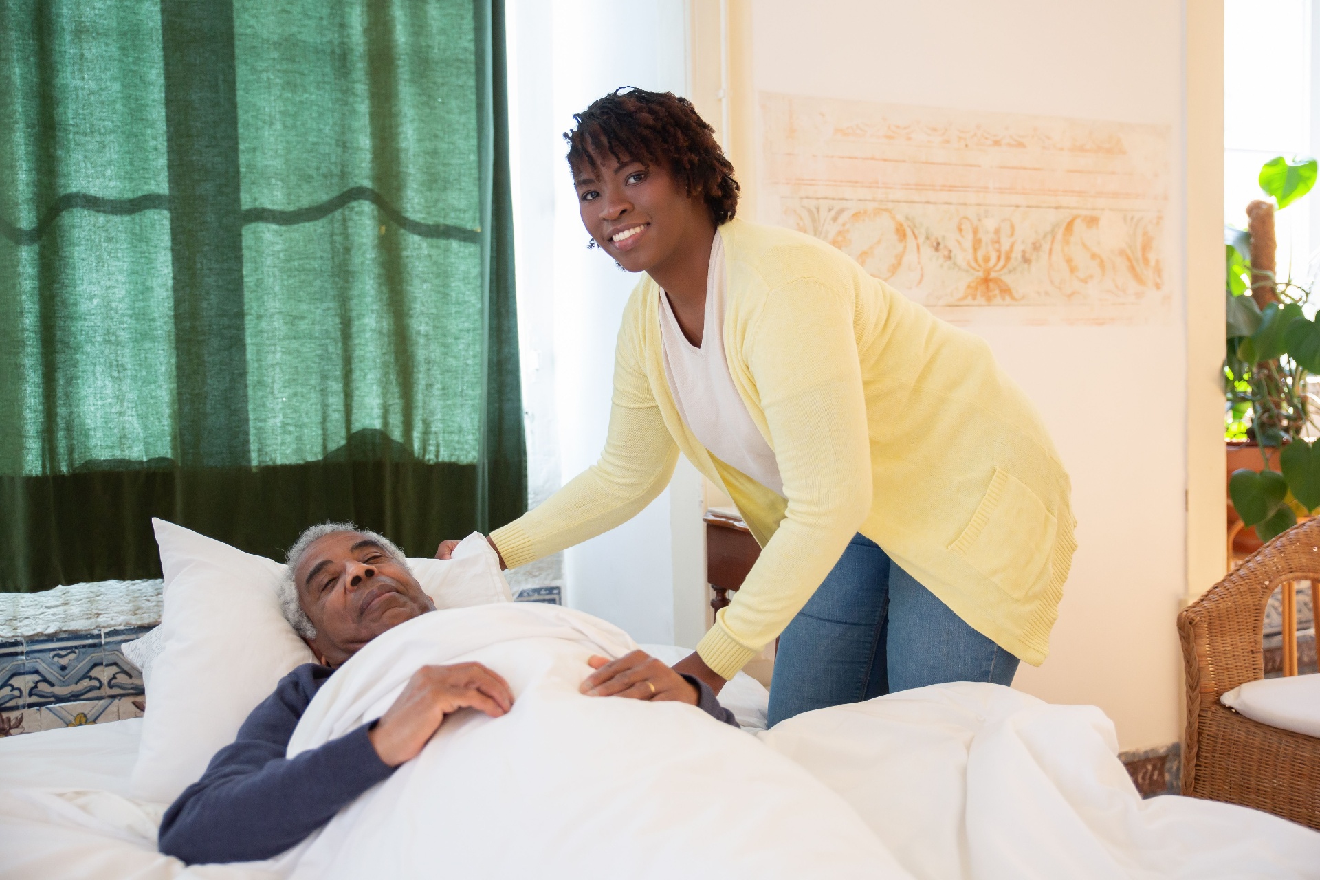 Caregiver helping a resident feel comfortable at home