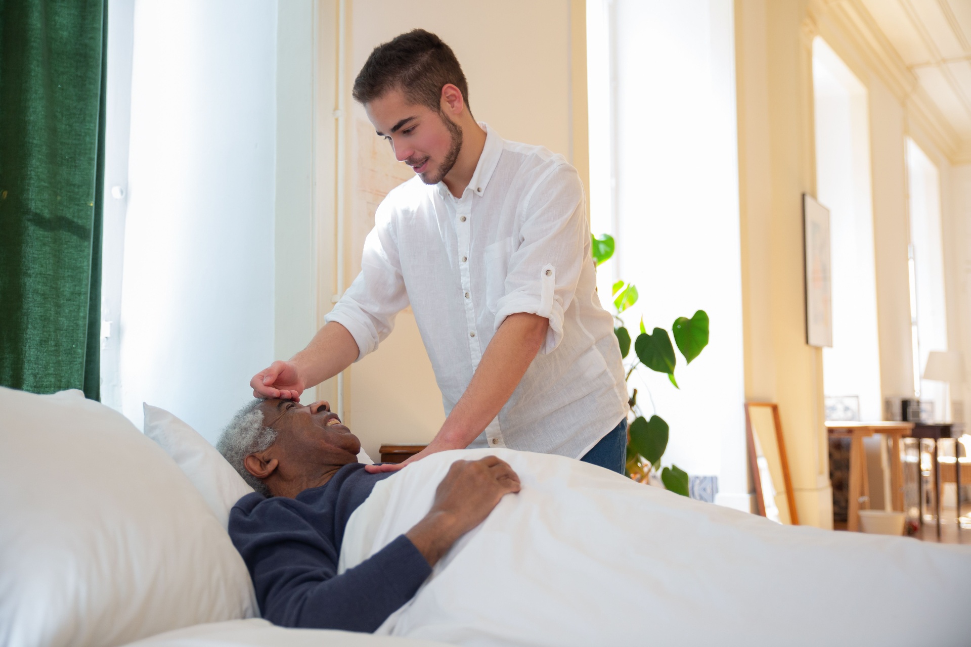 Caregiver providing attentive support in a home setting