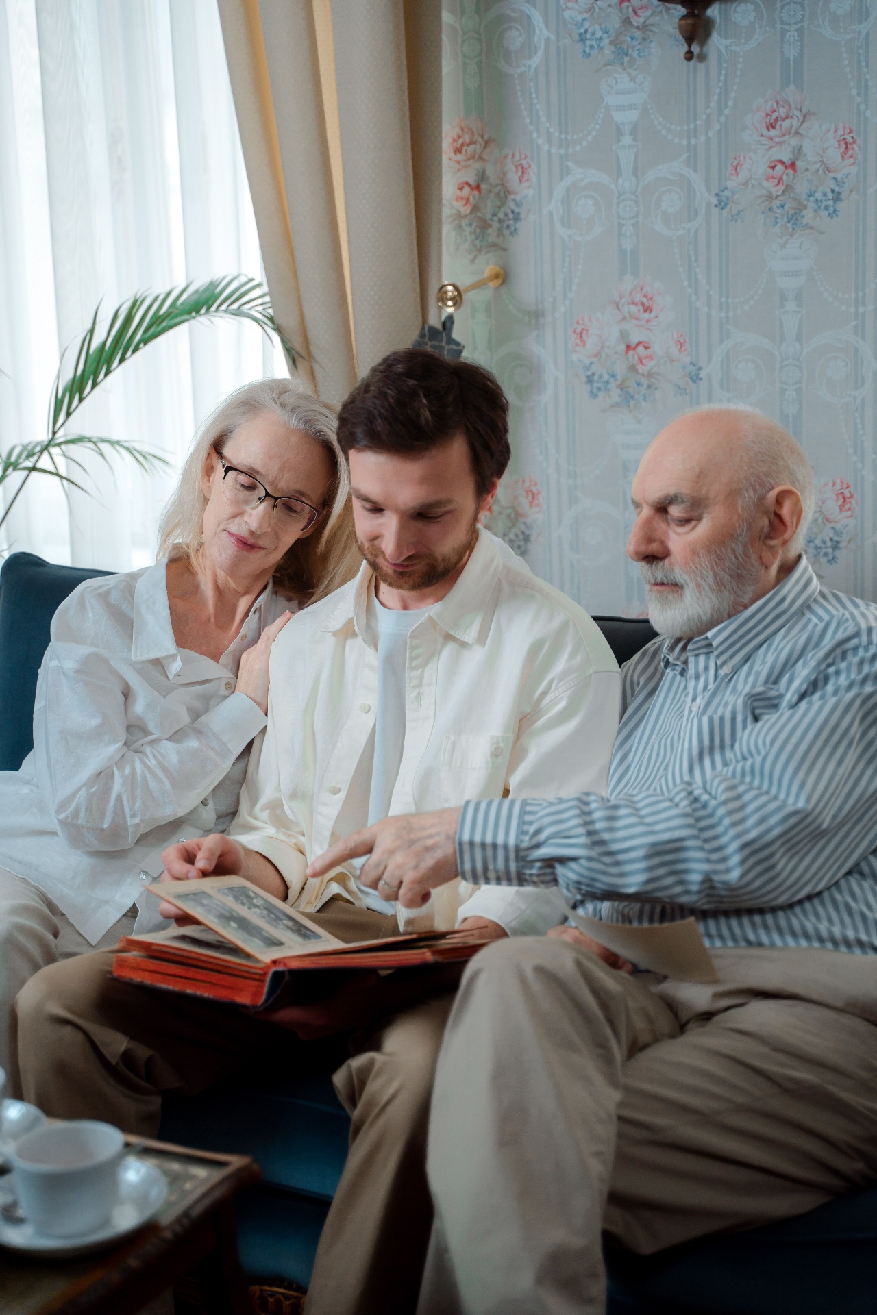 Family sharing memories together in a comfortable home setting